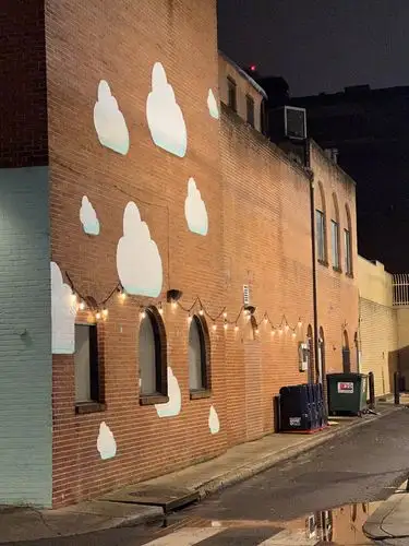 That moody alleyway glow hit different.